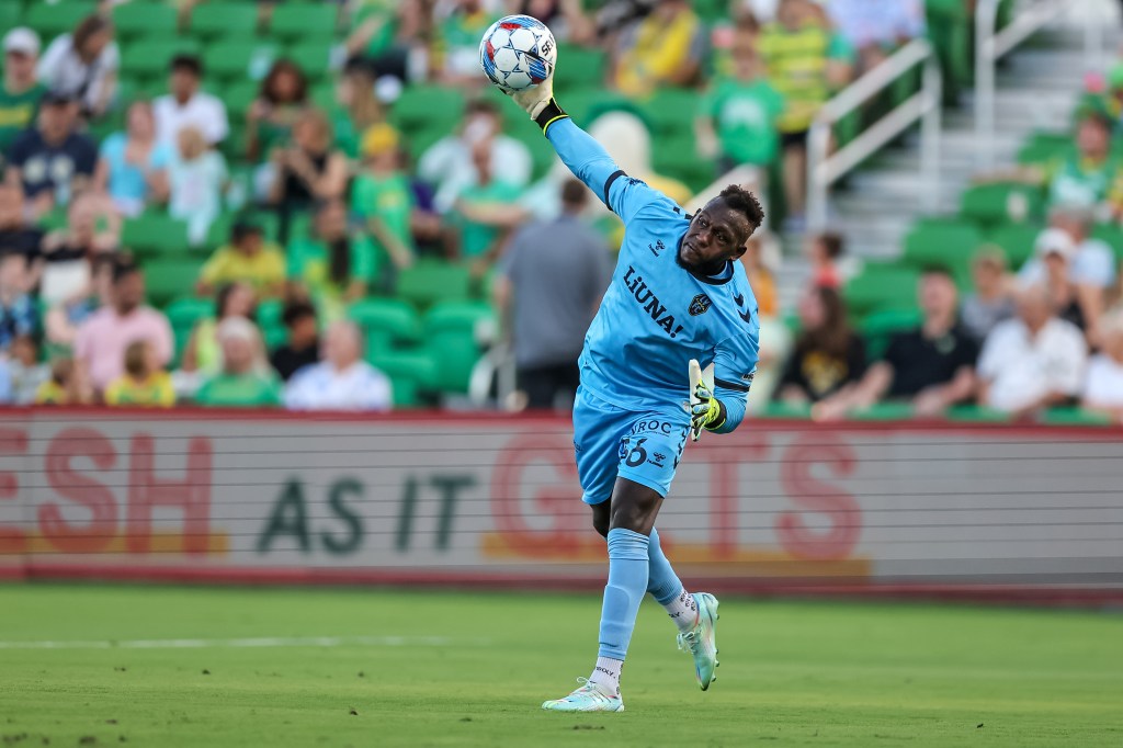 Las Vegas Lights goalkeeper Raiko Arozarena throwing a soccer ball