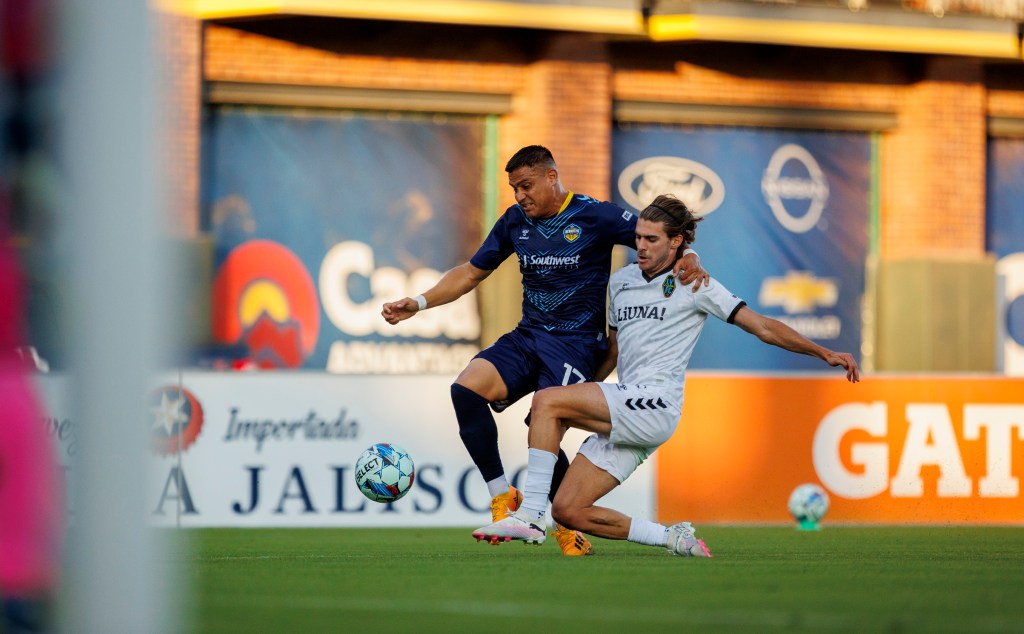 Las Vegas Lights FC defender Gennaro Nigro competing with a El Paso Locomotive FC player