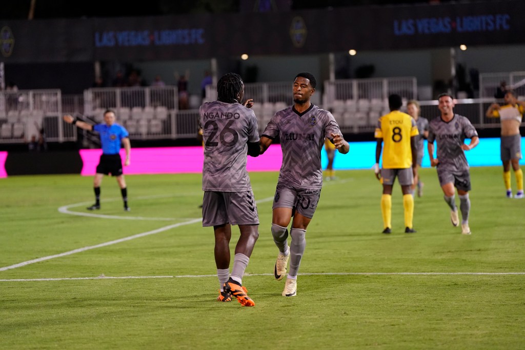 Las Vegas Lights players Khori Bennett and JC Ngando celebrating after scoring a goal