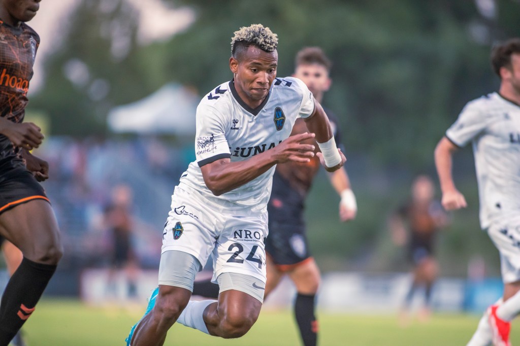 Las Vegas Lights FC defender Maliek Howell in a white away jersey