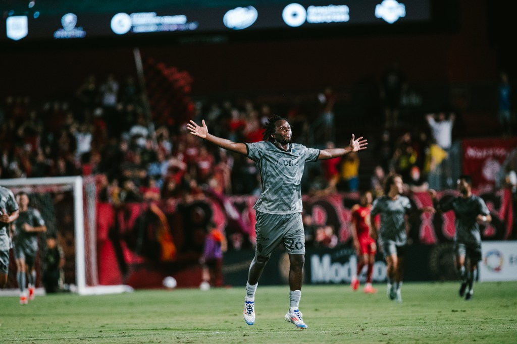 Las Vegas Lights FC midfielder JC Ngando celebrating a goal
